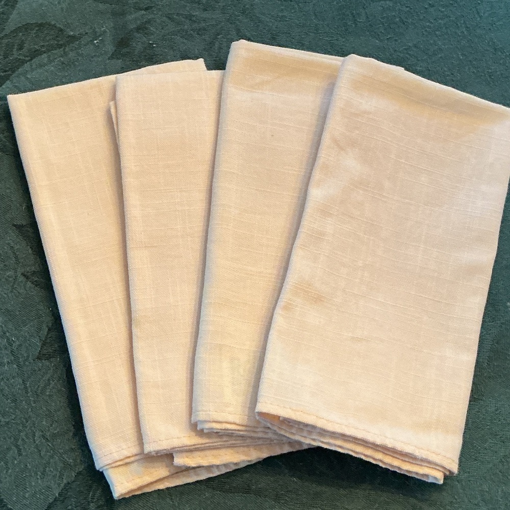 4 extra large pale yellow napkins.